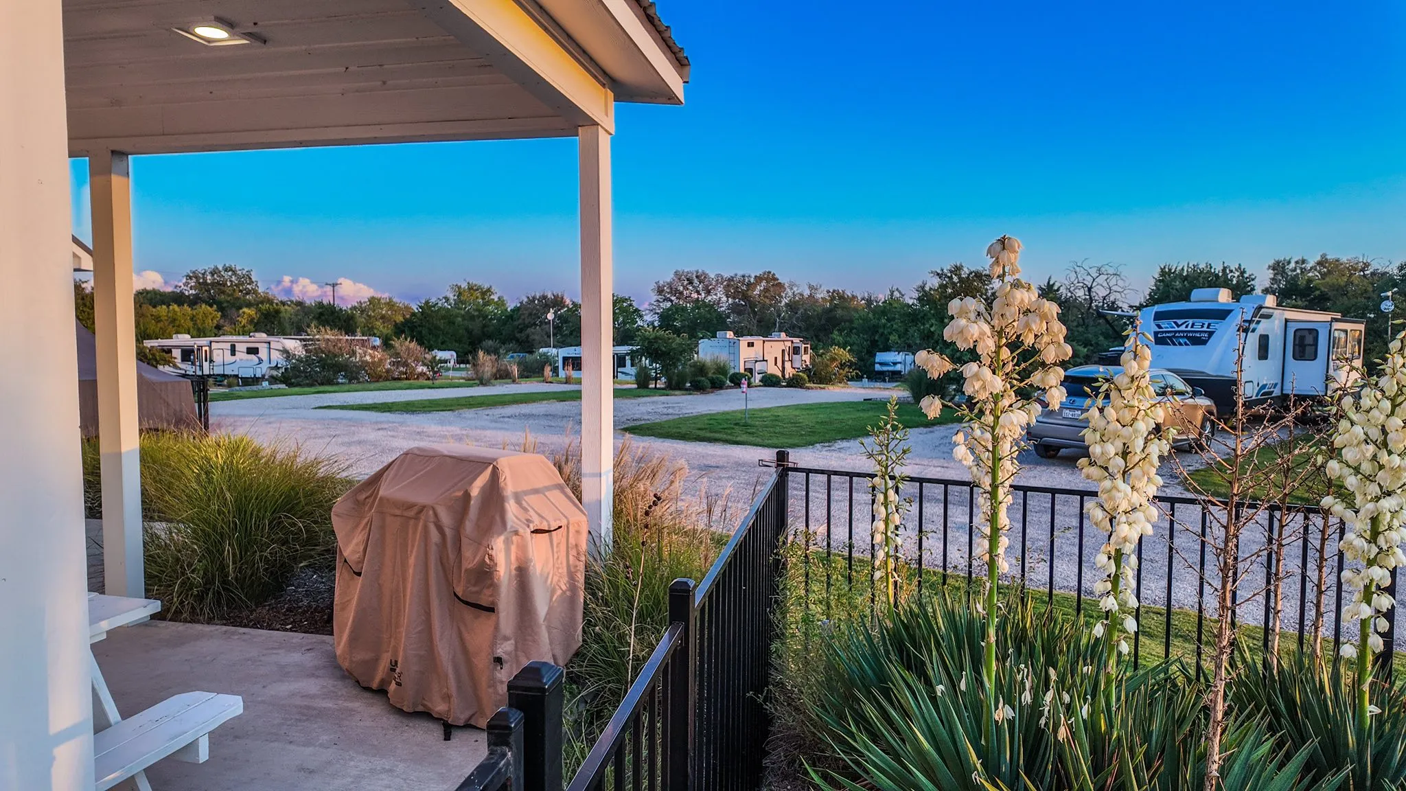 Covered farmhouse patio with grill