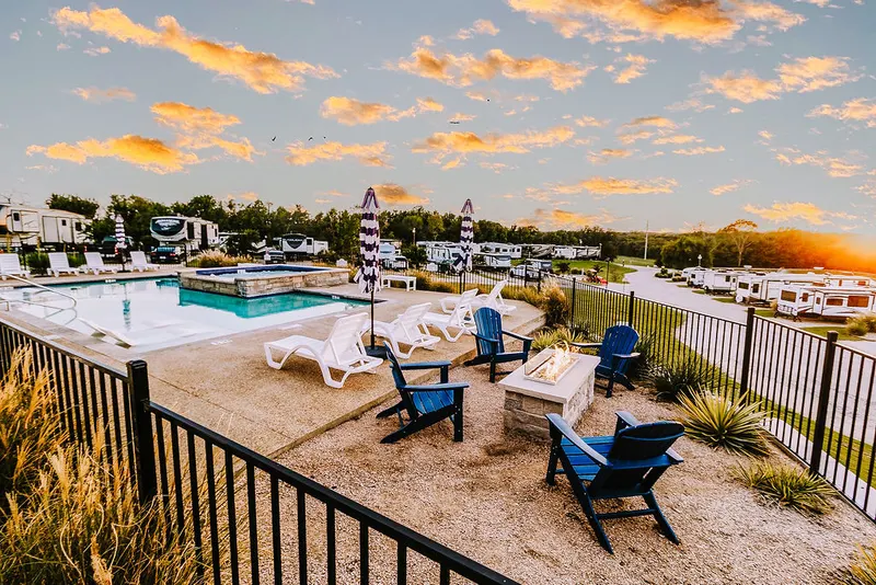 Pool deck at sunset with ornamental grasses