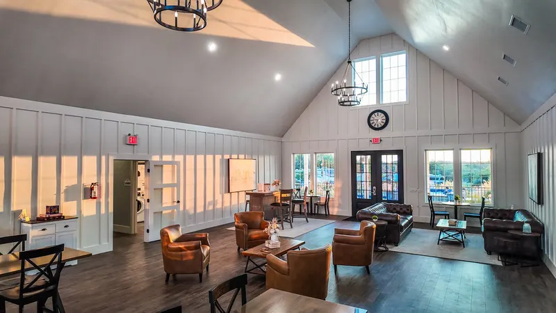 Farmhouse dining hall and lounge with warm lighting