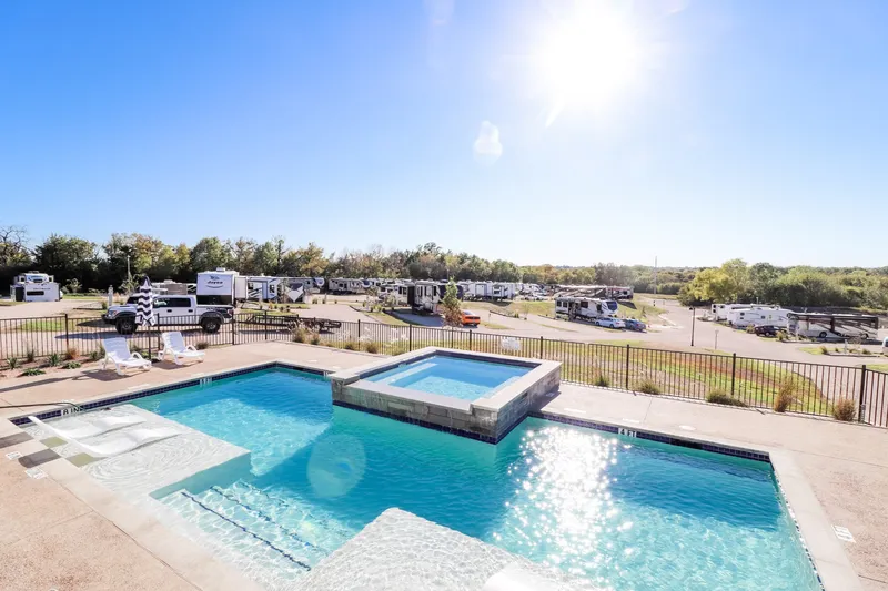 Heated pool and clubhouse at Sugar Hill RV Resort